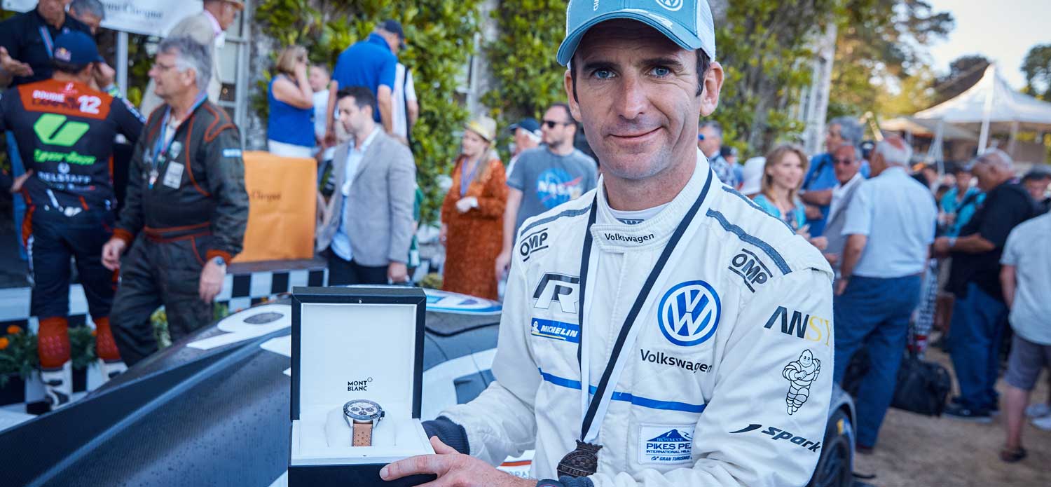 Romain Dumas of Volkswagen with the winner's Montblanc Timewalker after emerging victorious following a thrilling Top Ten Shootout, and mustering the third fastest ascent of the Hill in the Festival’s 25-year history.