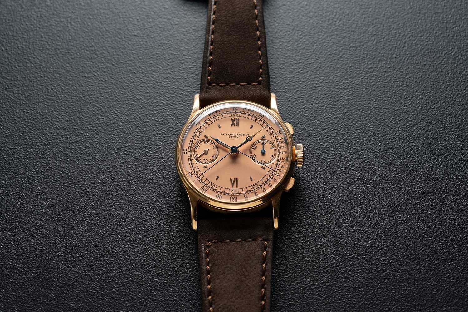 Lot 167: Patek Philippe Ref 1436 “Pink Split” (Image © Revolution)