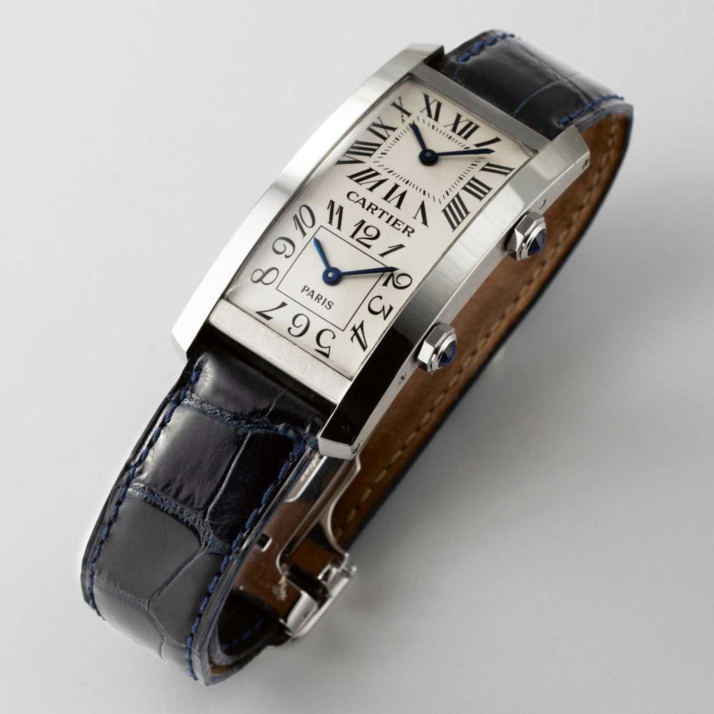 Rare Cartier Tank Cintrée dual time zone watch, driven by two small movements with Arabic and Roman numerals on the two dials (Image © Revolution)