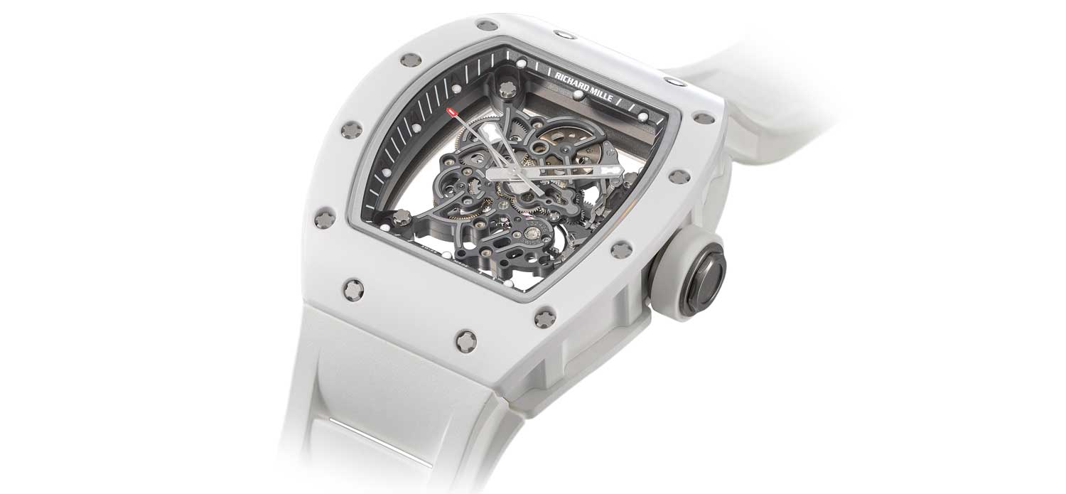 Lot 40: Richard Mille, a very fine and rare titanium and ceramic tonneau-shaped skeletonised wristwatch with sweep centre seconds, warranty, screw driver and box