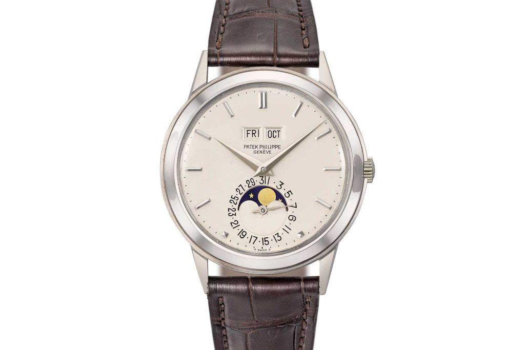 Lot 112: Patek Philippe, an extremely fine, very rare and highly attractive 18k white gold automatic perpetual calendar wristwatch with moonphase and box
