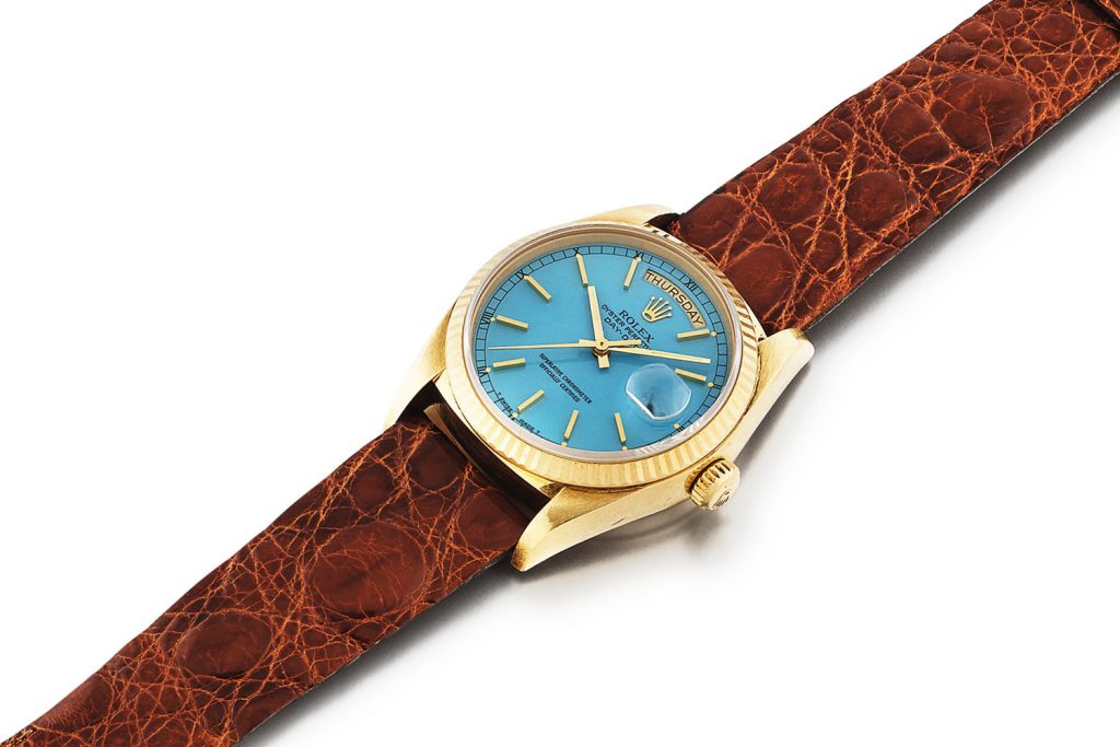 Lot 383: Rolex 'Stella' Day-Date Ref. 18038. Yellow gold wristwatch with day, date and blue Stella dial, circa 1986