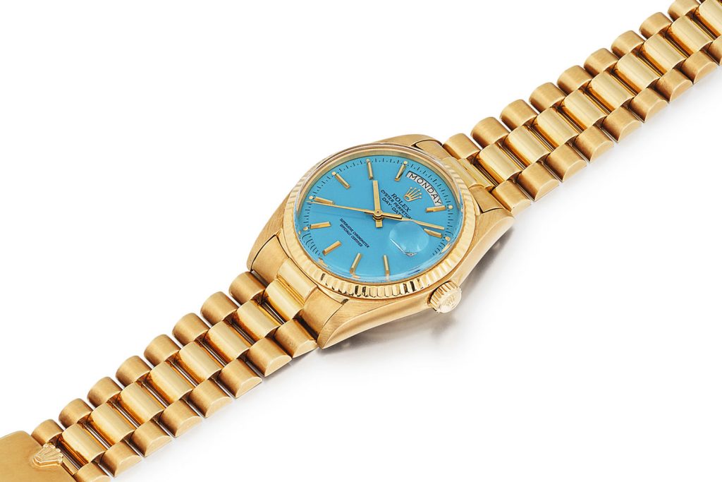 Lot 388: Rolex 'Stella' Day-Date Ref. 1803. Yellow gold wristwatch with day, date and blue Stella dial, circa 1975