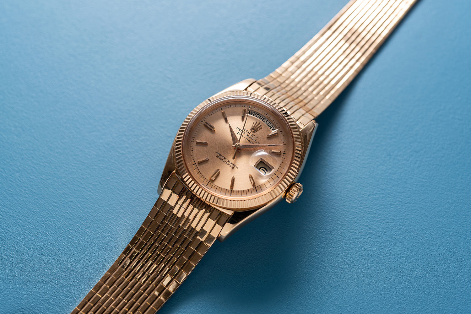 Lot 243: Rolex Ref. 1803. A very rare and impressive pink gold wristwatch with center seconds, day, date and brick link bracelet (Image: Chris Beccan)