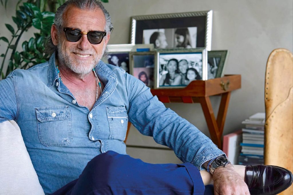 Alessandro at home, wearing a steel Titus Calypsomatic with cal. ETA 2472, 1975. Fortela pants, Edward Green shoes and vintage chambray shirt