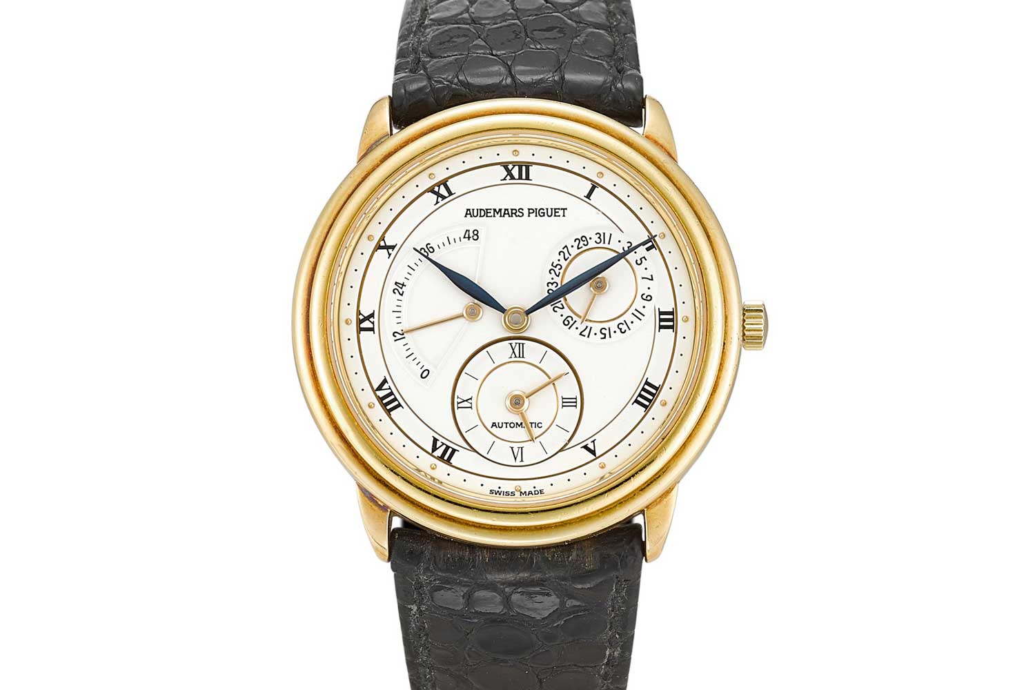 Audemars Piguet Dual Time reference 25685.002 - A yellow gold dual time zone wristwatch with date and power reserve indication from 1995