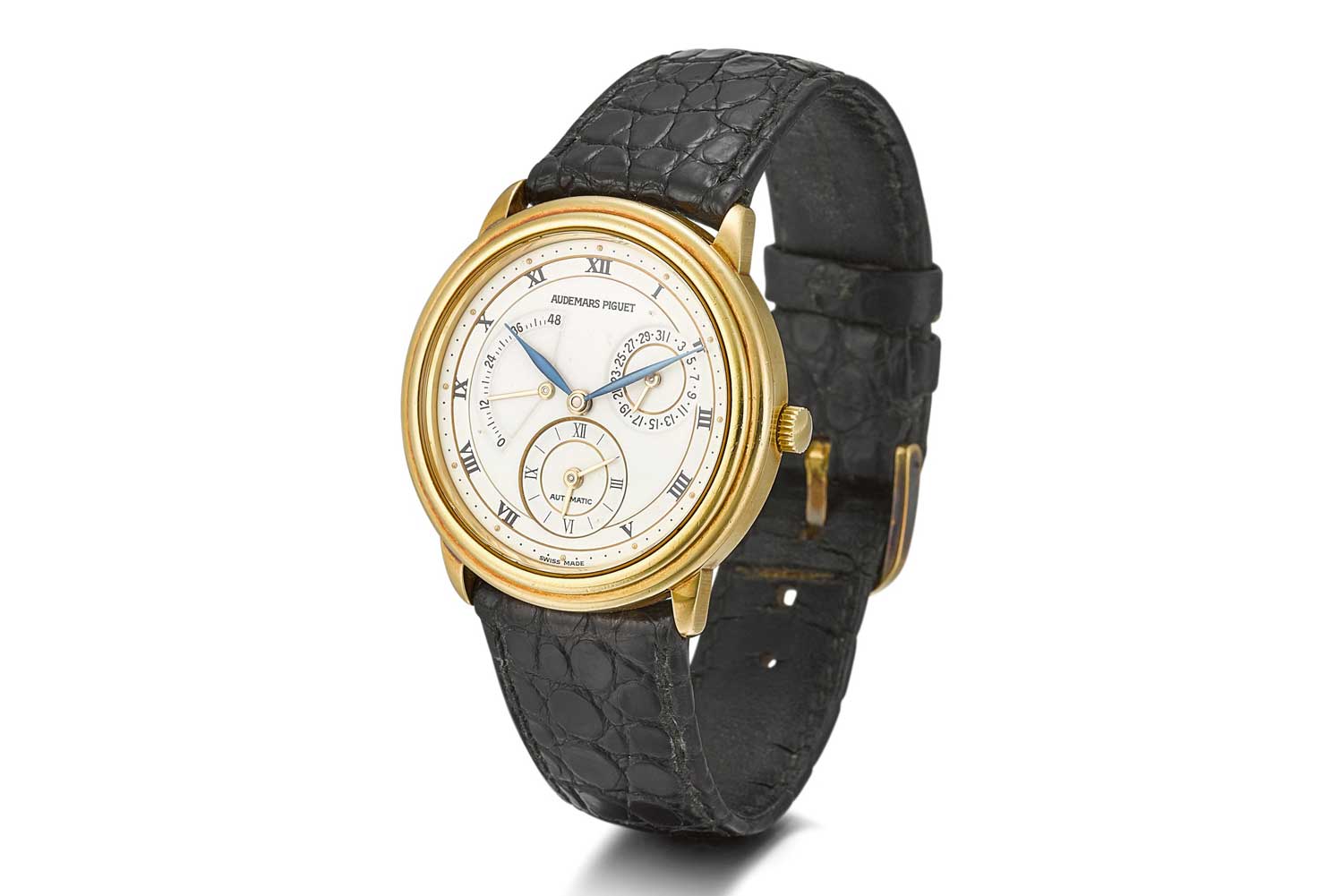 Audemars Piguet Dual Time reference 25685.002 - A yellow gold dual time zone wristwatch with date and power reserve indication from 1995