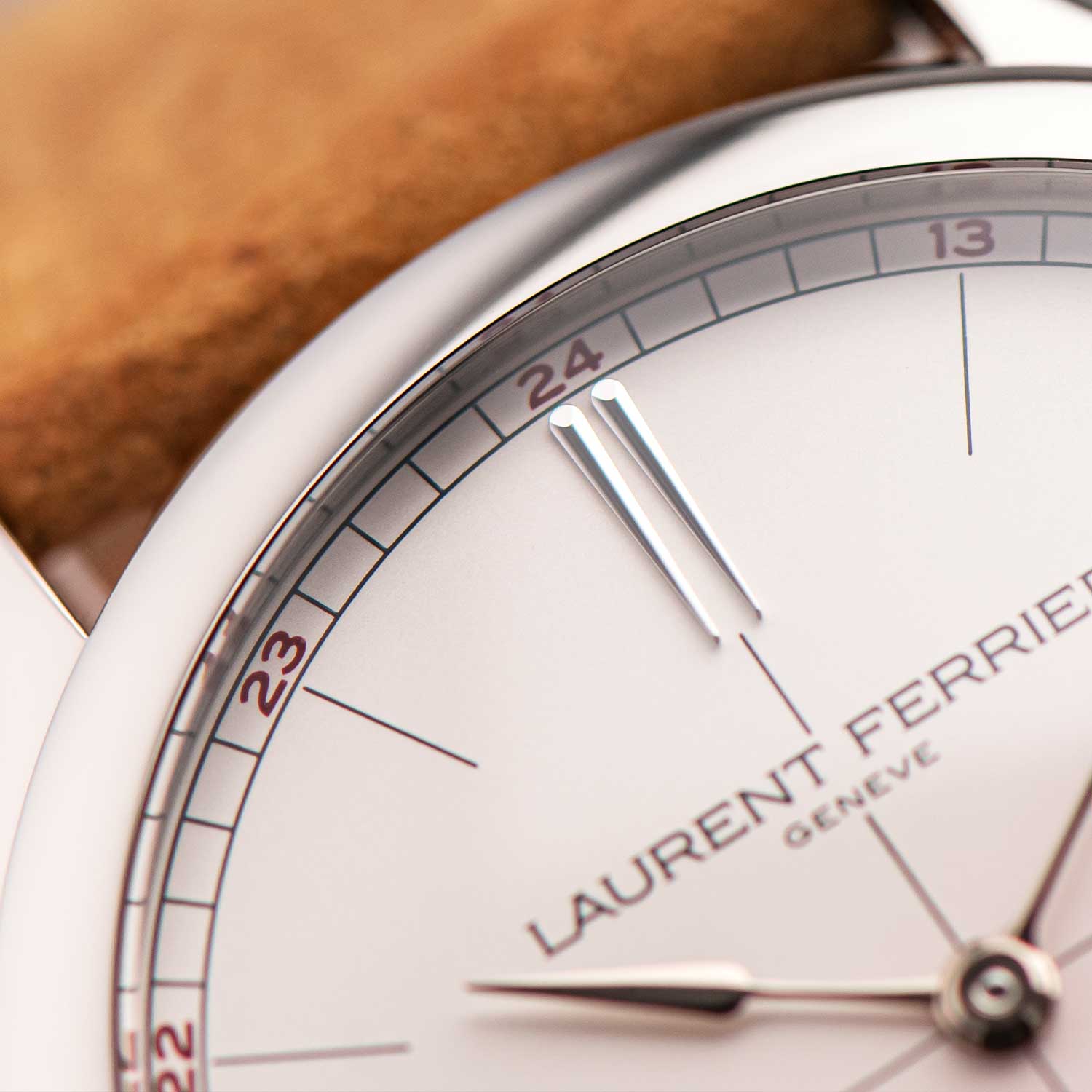 A closeup on the 12 o'clock hour marker in 18k white gold on the Laurent Ferrier Classic Origin Opaline