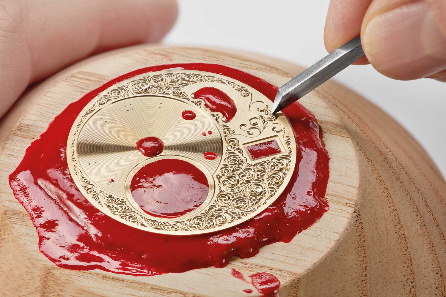 The spectacular engraved dial, a complex process taking 27 steps, and a full day to complete.