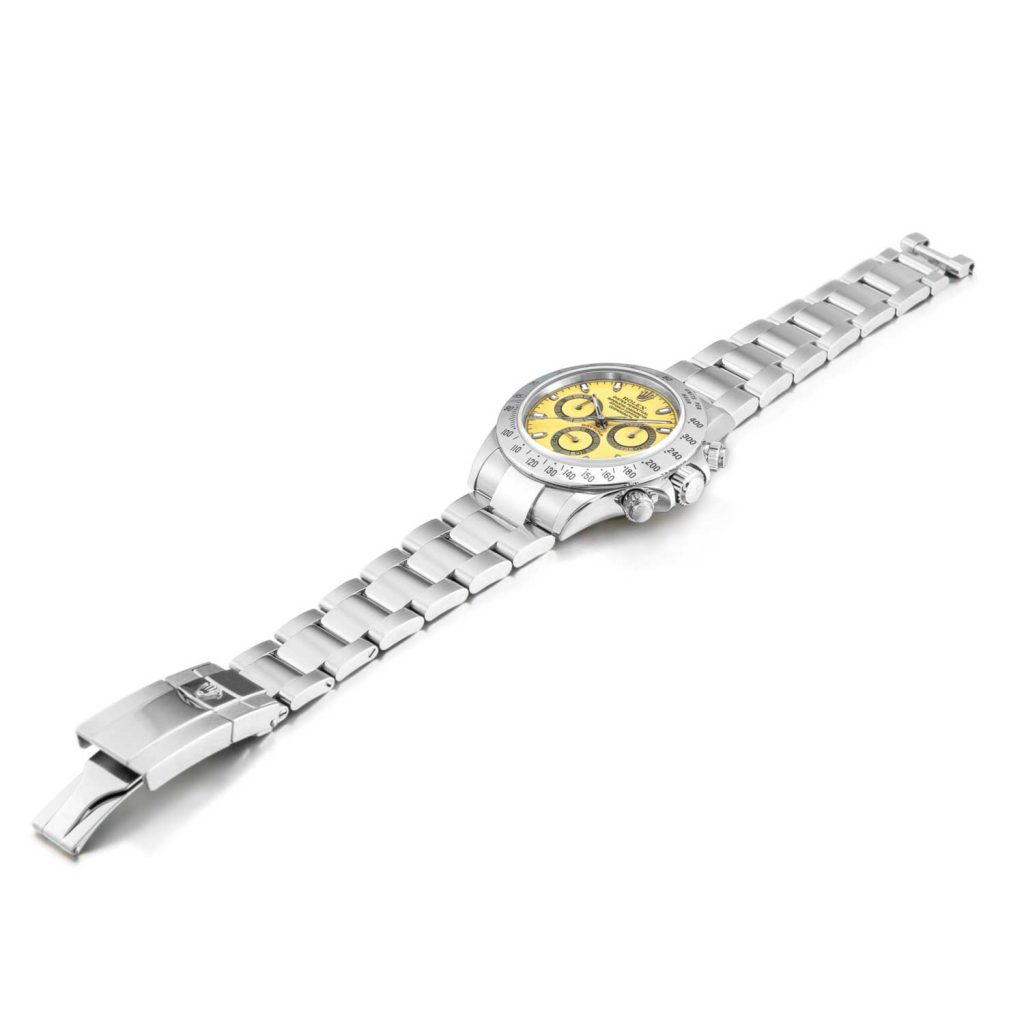 Rolex Cosmograph Daytona, Reference 116520 A Stainless Steel Chronograph Wristwatch With Citrus Dial And Bracelet, Circa 2000