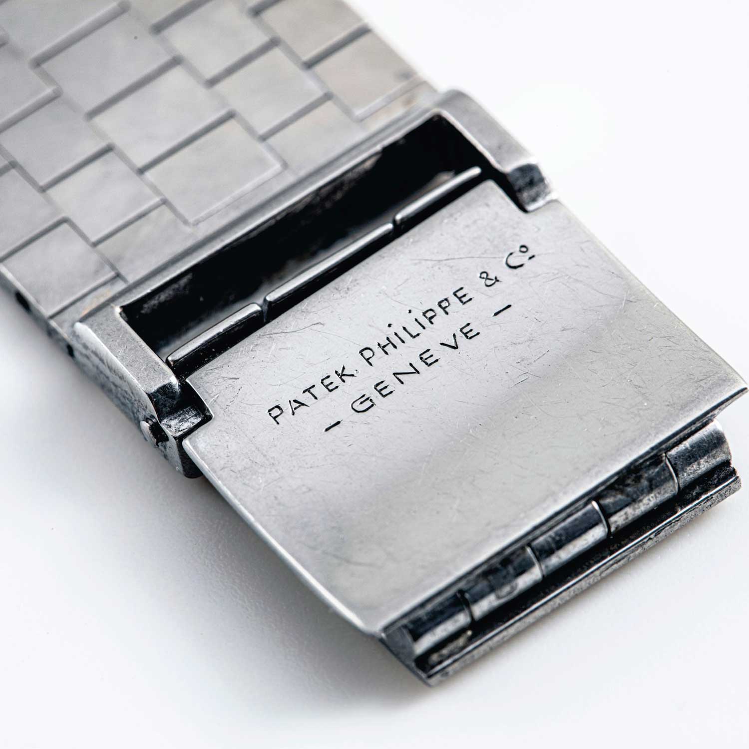 Lot 2481: Patek Philippe Platinum Calatrava with Diamond Hour Markers and 18k White Gold Bracelet, Ref. 2484, Confirmed by the extract from The Archives