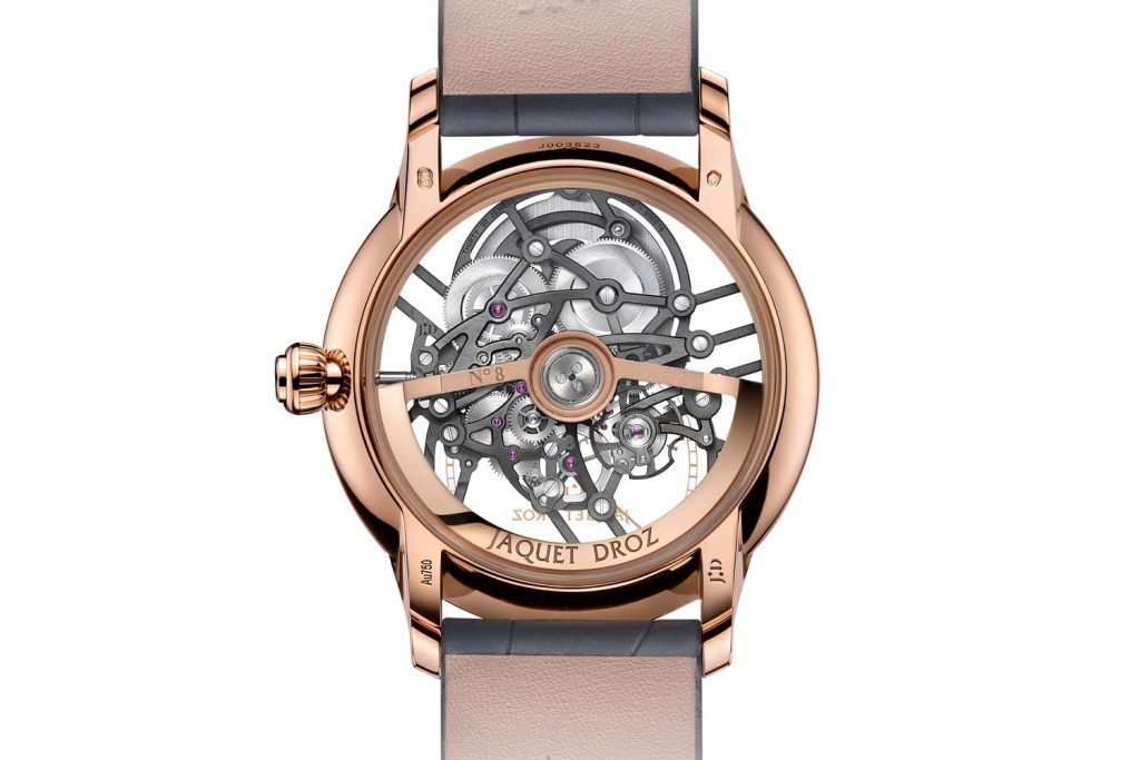The the Jaquet Droz 2663 SQ self-winding mechanical movement seen through the caseback of the Seconde Skelet-One in red gold (41mm)