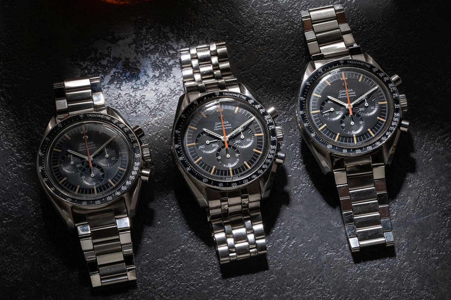 Not one, not two, but THREE examples of the Reference ST 145.012 Omega Speedmaster "Ultraman" that are part of Revolution's permanent Speedmaster collection, at the Revolution Watch Bar (©Revolution)
