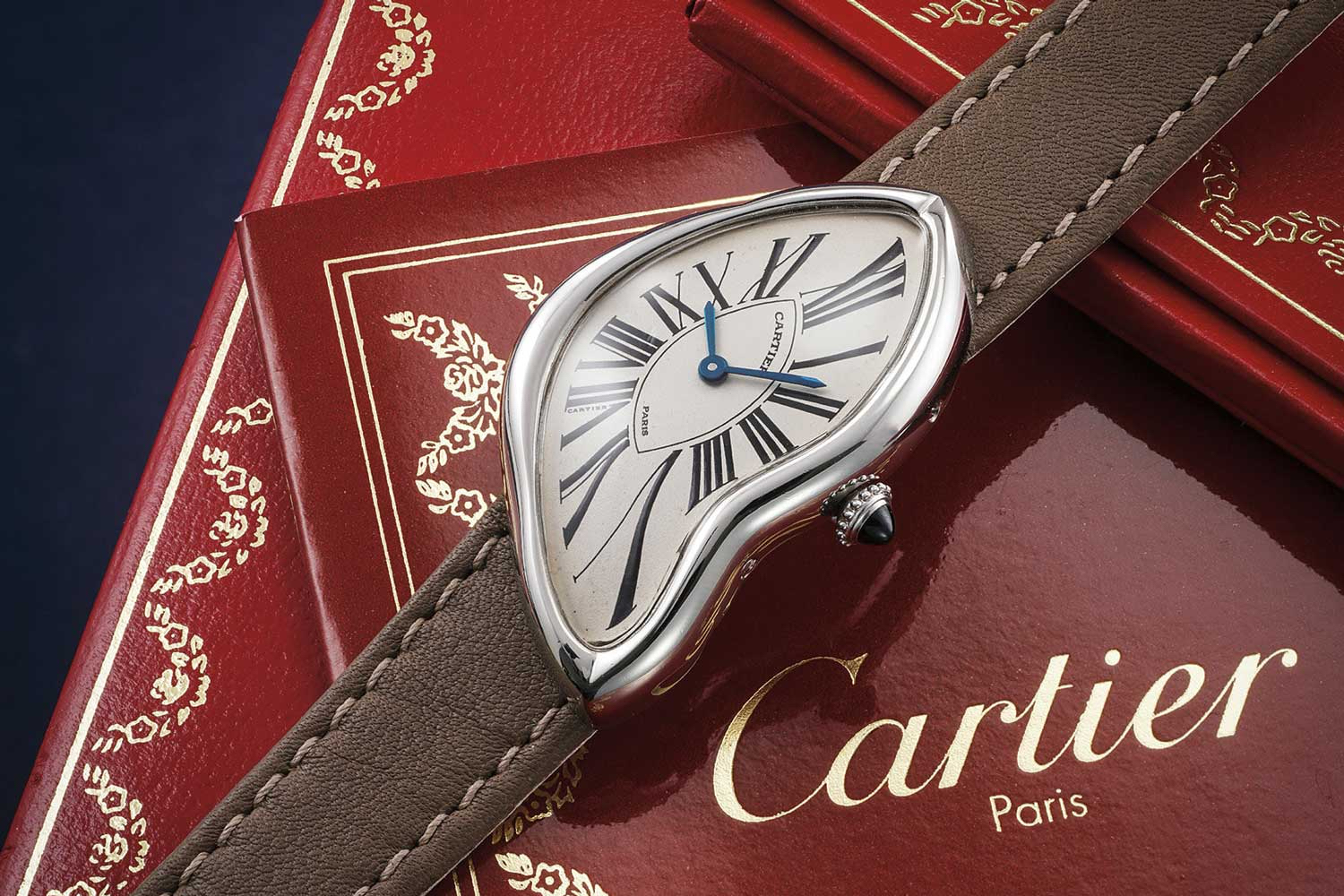 A 1992 Cartier Tank Crash: a highly limited version produced in the early 1990s and cased in platinum - the rarest case metal and most exclusive version of the 1990s Crash, sold through the maison's prestigious Paris boutique; this particular example sold with Phillips at their November 2020 Geneva auction, for CHF258,300 (image: phillips.com)