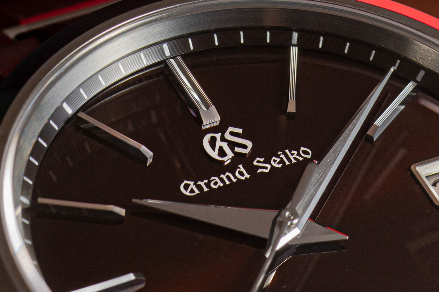 The Grand Seiko Hi-Beat SBGH245G with a sunray finish dial that creates an almost constant lightshow on the wrist when outdoors and is a hue that is mid-way between brown and burgundy (©Revolution)