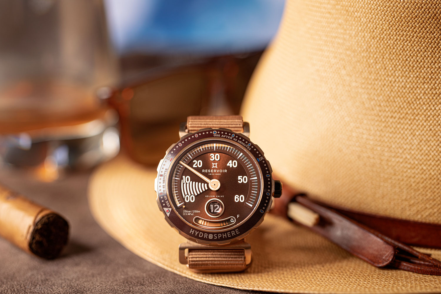 The Reservoir Hydrosphere Bronze x Revolution “The Maldives Edition” has a dial with the perfect colour of the sunset, and complemented by a beautiful sunray effect emanating from the centre (©Revolution)