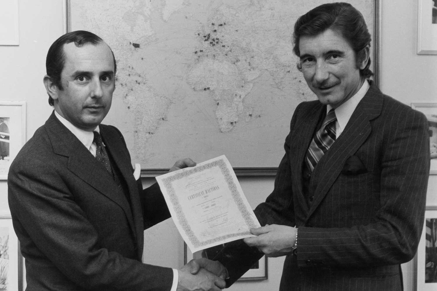Jack Heuer (left) with Jo Siffert. Siffert was one of the first Formula 1 drivers to be sponsored by a watch company when Heuer signed a partnership deal with him in 1968