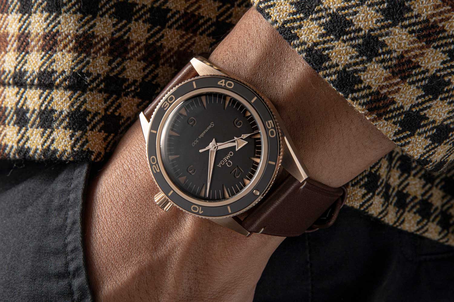 The Seamaster 300 Bronze Gold is made from Omega’s new patent-pending alloy that features 50 percent copper and 37.5 percent gold. Omega also uses palladium to enhance the hue of the material to make it much more luminous. (©Revolution)