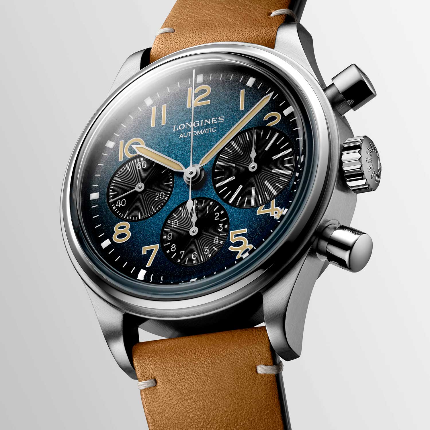 The beige numerals and black registers lend a refreshing contrast to the watch’s petrol blue dial