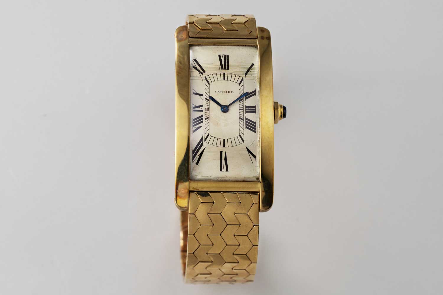 1951 yellow gold Cartier Tank Cintrée with original yellow gold bracelet; this particular example is from the private collection of Auro Montanari (©Revolution)