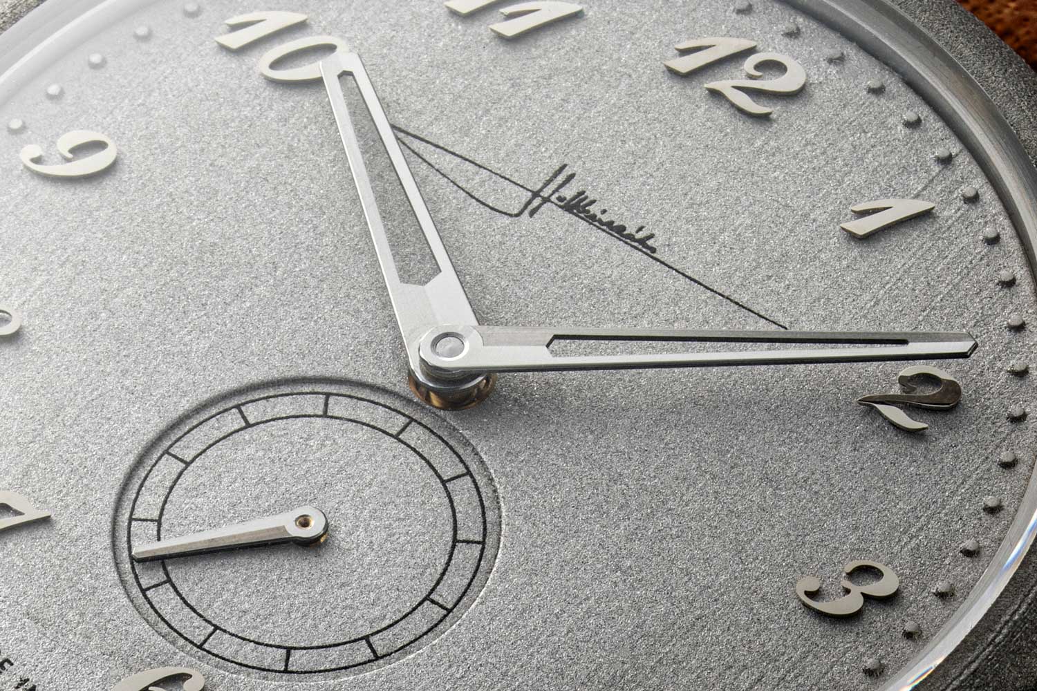 A closer look at the sandblasted-type finish dial contrasted by high-polished angular applied Breguet numerals on the Holthinrichs Brutal Elegance Ornament for Revolution