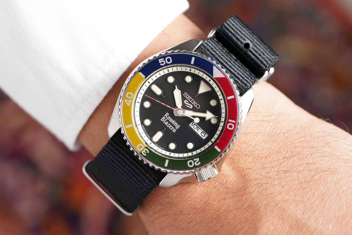 The four color colorblock bezel brings a retro vibe to an already cherished watch design.