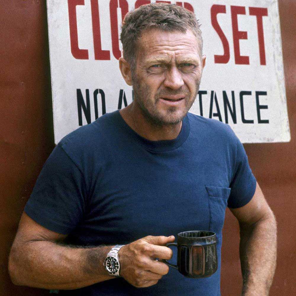 McQueen on the set of 'Papillon,' wearing his Rolex Submariner ref. 5512 (Image: Ron Galella)