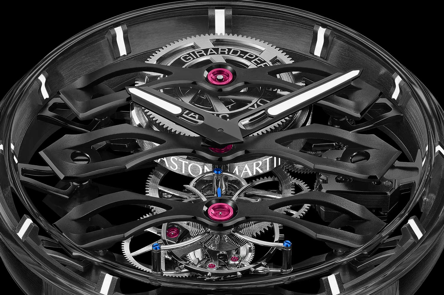 Mounted with the barrel of the barrel on the Girard-Perregaux Tourbillon with Three Flying Bridges – Aston Martin Edition is the solid gold mirco-rotor with the name Aston Martin engraved on the flank of the rotor and filled with white lume that glows blue in the dark