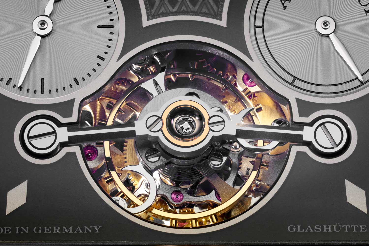 The aperture created for the subdials and the tourbillon presented the team at Lange a sizeable challenge in balancing proportions and material tolerances; the subdials are white gold and rhodium, and are inserted into the dial from the back; the endstone we see on top of the tourbillon here is a piece of diamond, there is a second one that is placed on the other end holding the tourbillon in place (©Revolution)