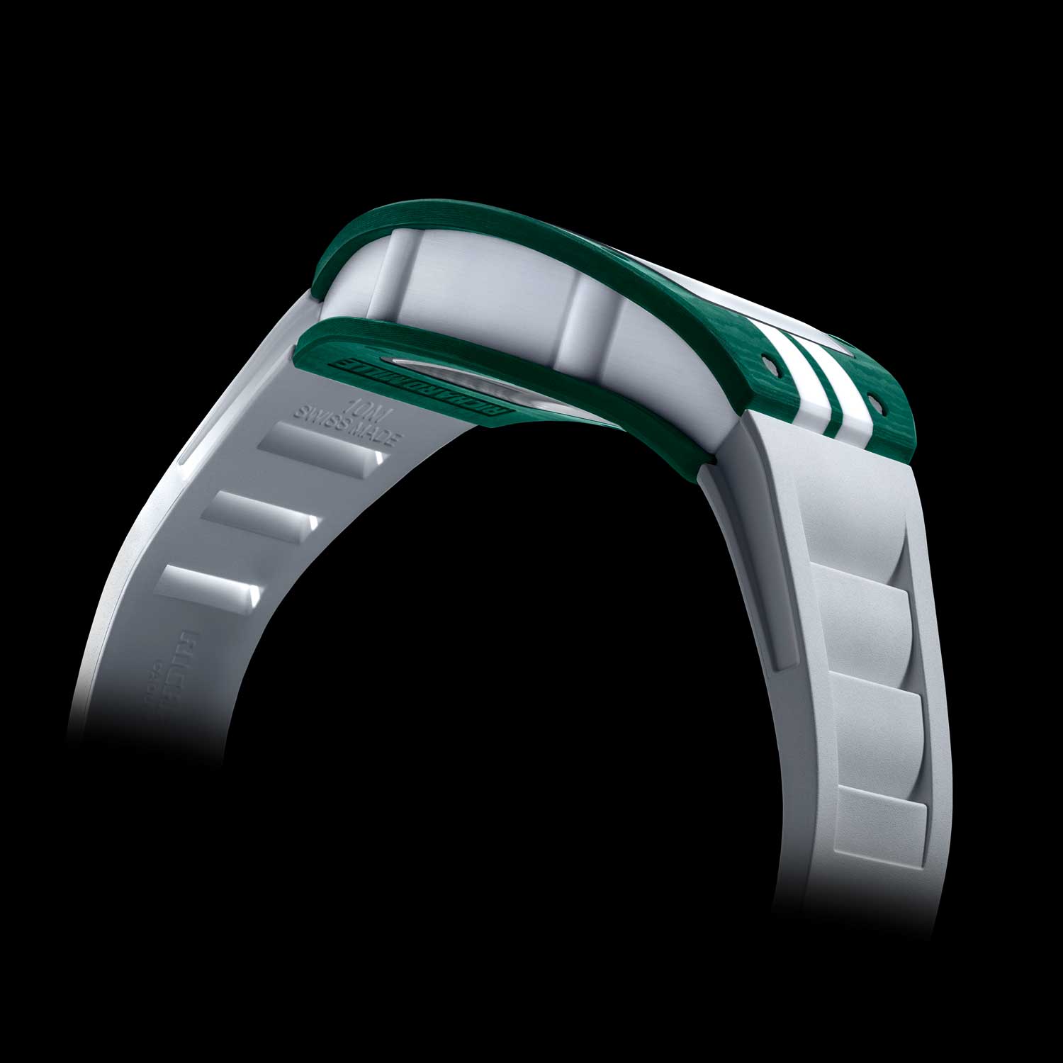 The RM 029 has a caseband milled from a solid block of white Quartz TPT®, offset by front and back bezels in green Quartz TPT®