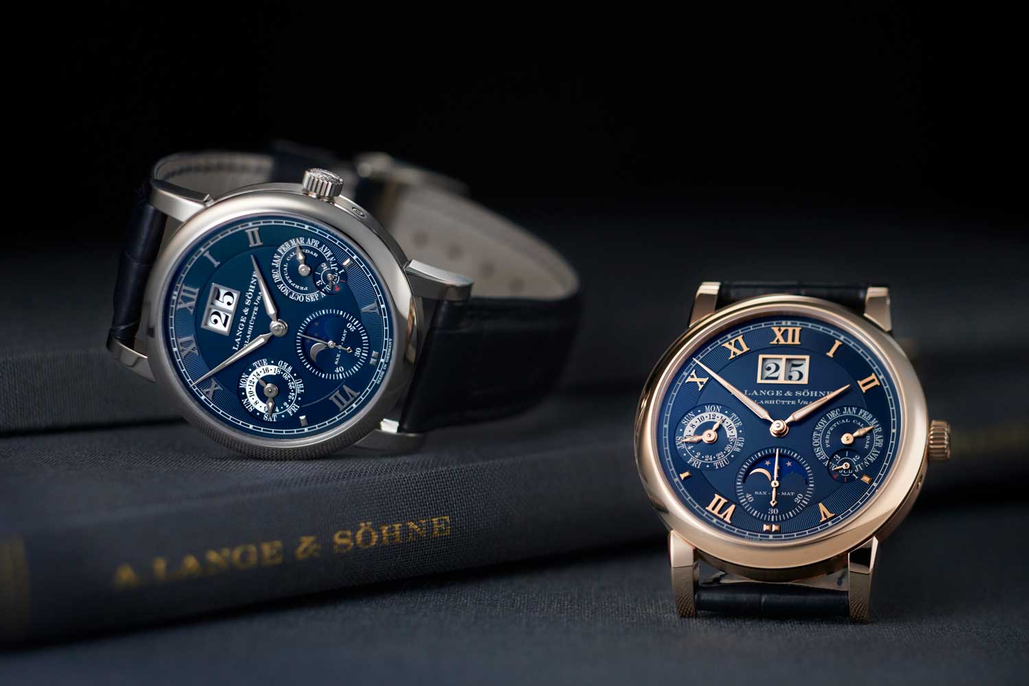 The 2021 A. Lange & Söhne Langematik Perpetual – Ref. 310.028 & 310.037, in white and pink gold with blue dials to mark the watch's 20th birthday (©Revolution)