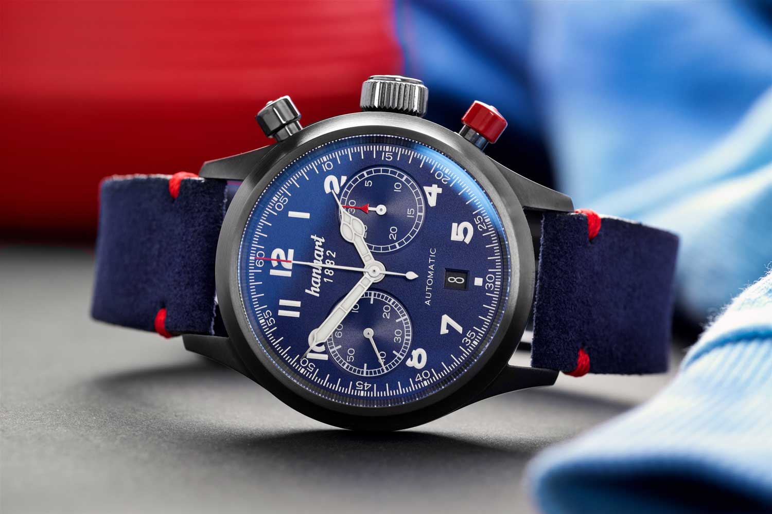 This 42mm limited edition watch features a royal blue bi-compax dial which comes on a blue ox leather strap complete with a suede finish and red accents.