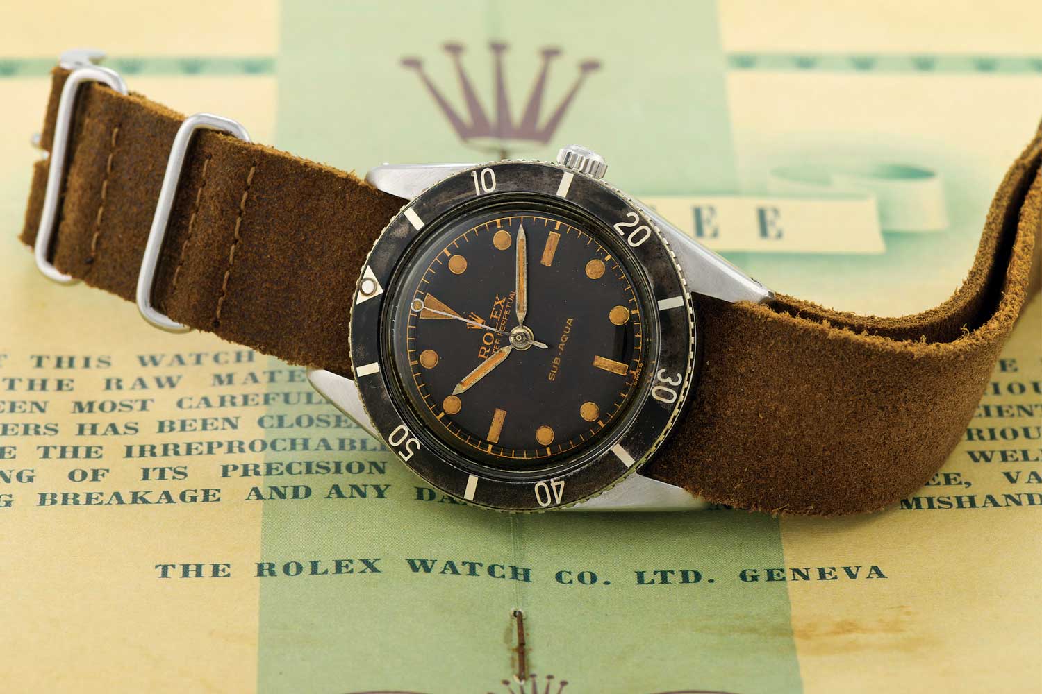Rolex-Submariner reference 6204 was the very first dive watch to be rated to a depth of 100 metres. The watch had a highly legible dial layout, with hands that like the painted hour hands were filled with Radium. Image: Antiquorum