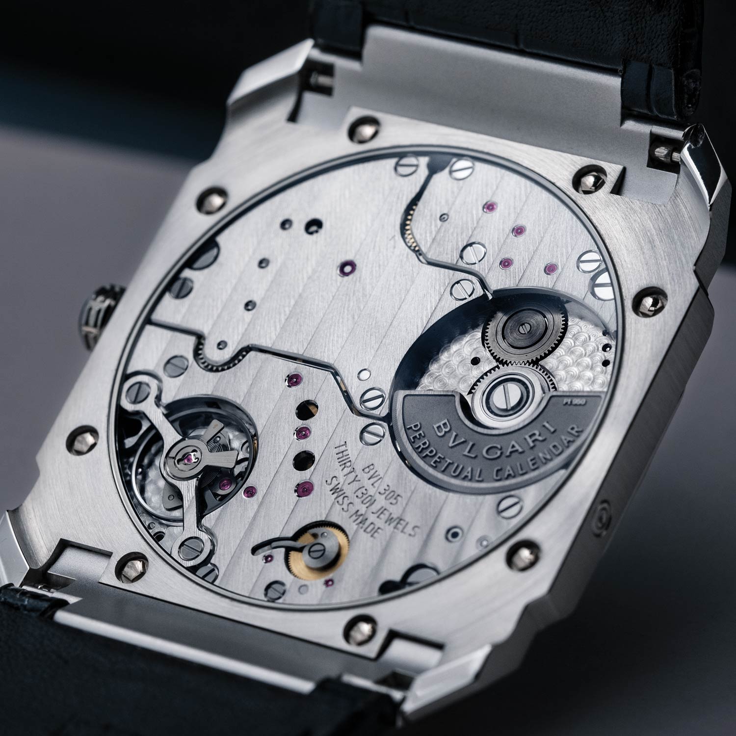 The laser engraved platinum rotor has a matte sandblasted type finish applied to it, leaving the polished words “PERPETUAL CALENDAR” to stand out in sharp relief