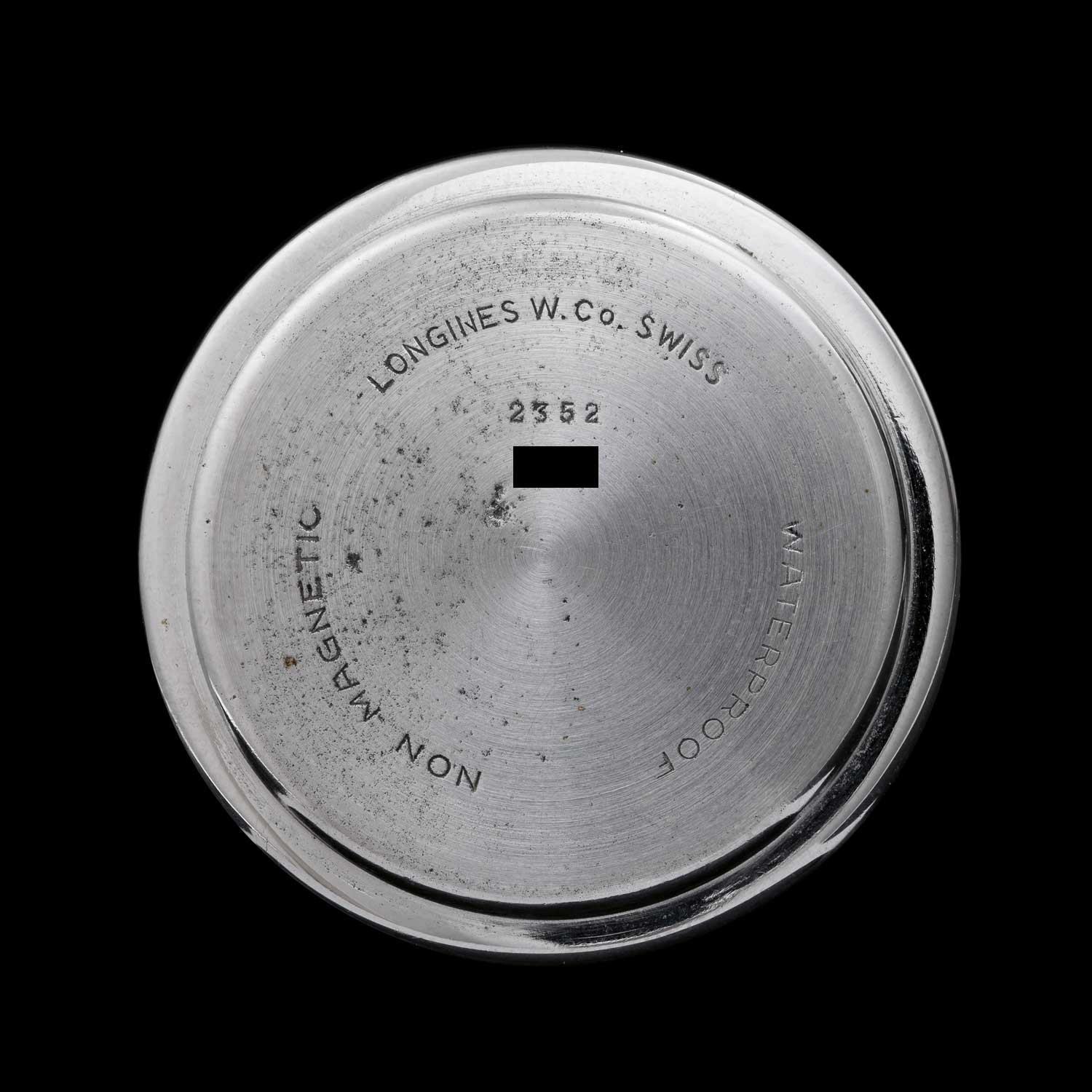 The ref. 4270 with a stainless steel snapback, stamped with the order no. 2352 and the words “waterproof”and“nonmagnetic”.