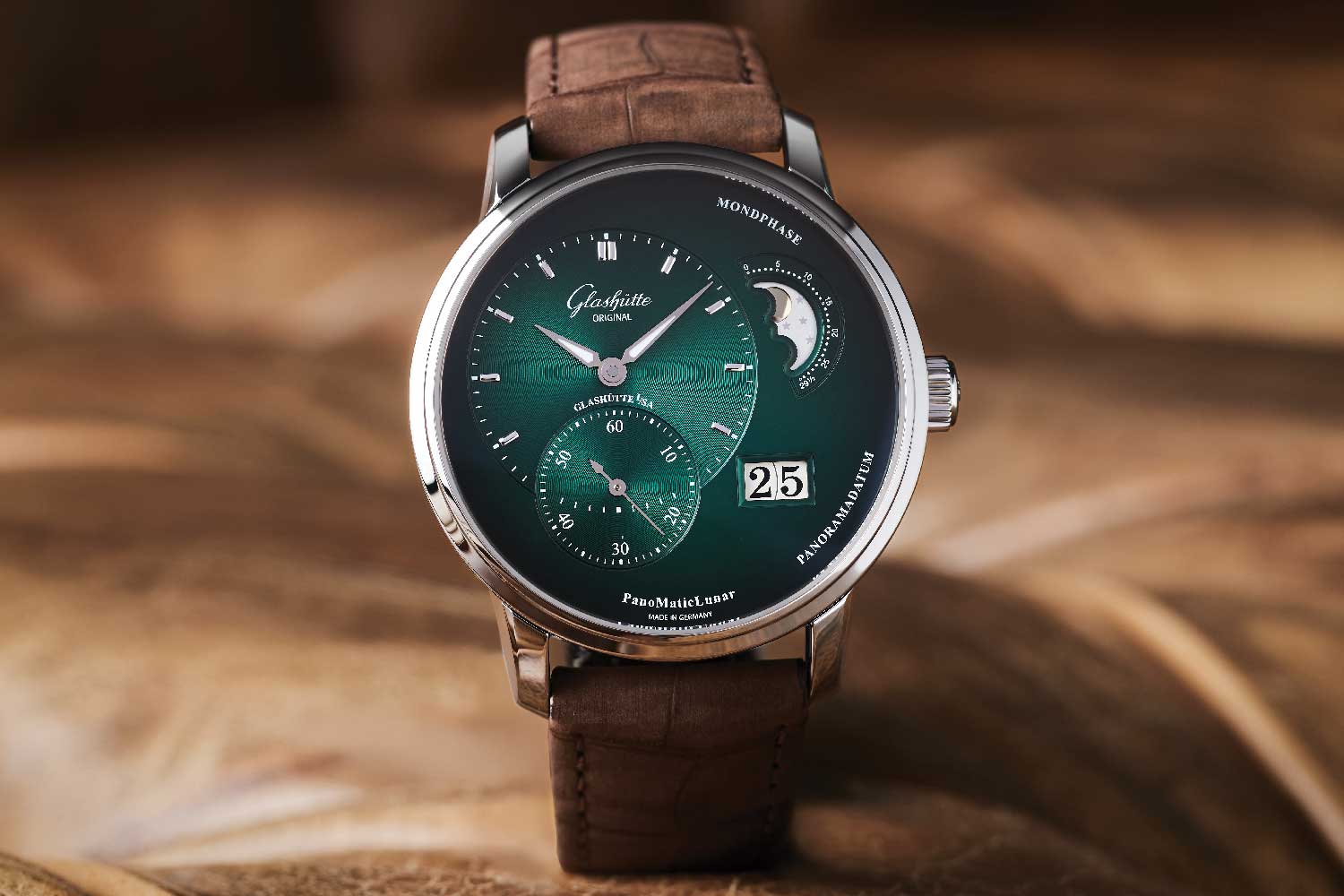 PanoMaticLunar in steel with an off-centered green-black dial, Panorama Date, and silver moonphase on brown Louisiana alligator nubuck leather strap.