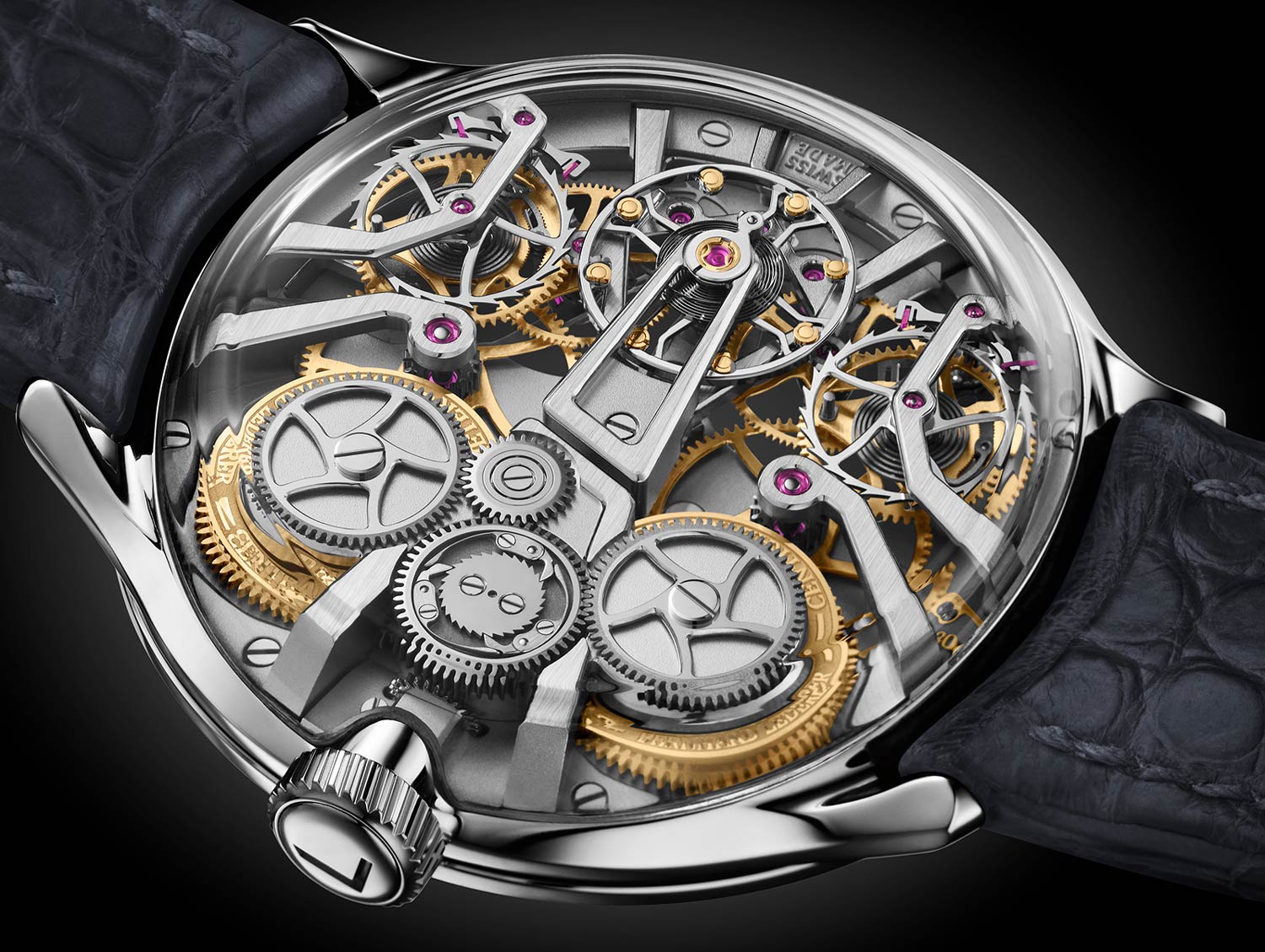 Visible through a domed sapphire case back, all components of the gear trains are secured to the base plate with slim bridges, offering an immersive view into the movement