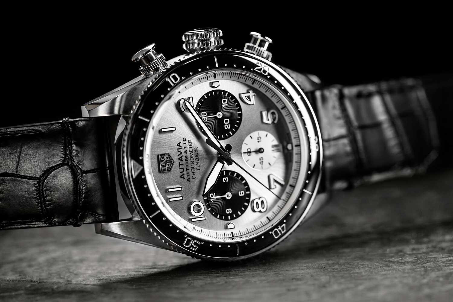 Autavia 60th Anniversary Flyback Chronograph with silver dial and black counters evokes the panda-dial Autavias that were released in very limited quantities in the 1960s