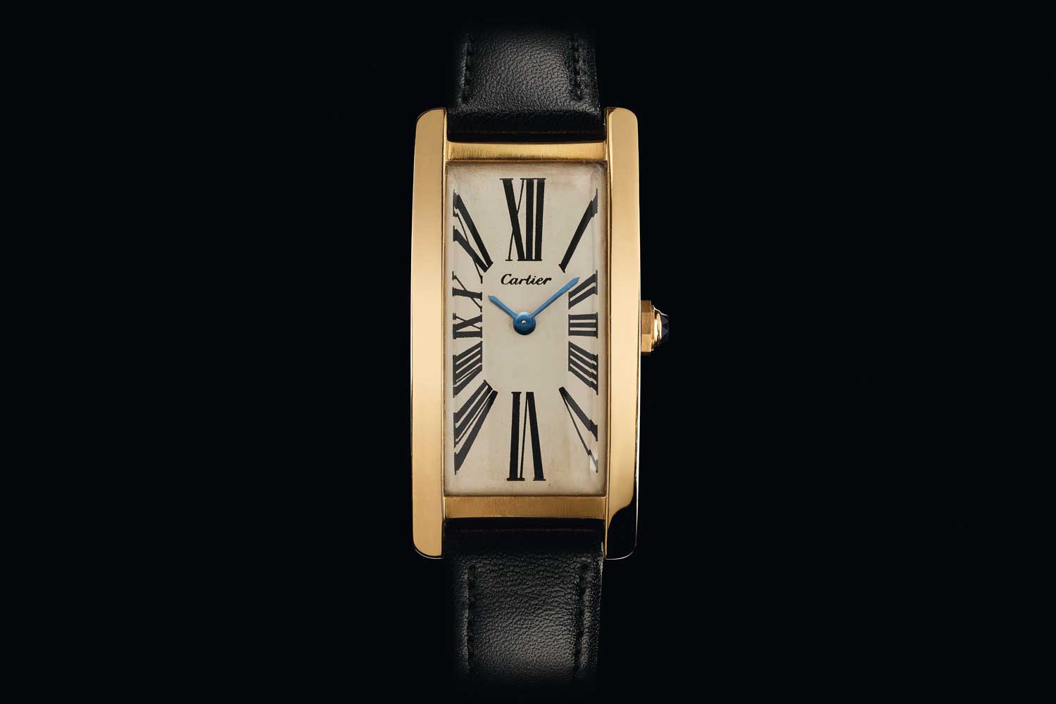 A large, curved Tank JJC from 1973 by Cartier London