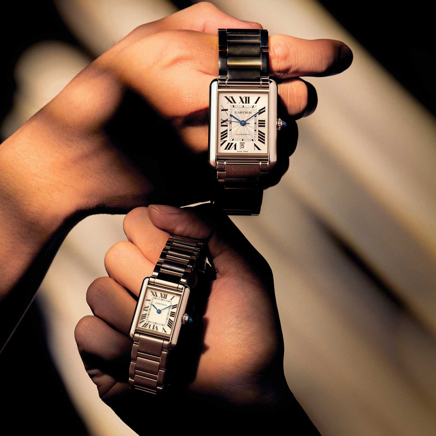 Whether driven by a mechanical movement or quartz, there's no mistaking the powerful geometry and all-day appeal of the Cartier Tank Must. From top: Tank Must Extra-Large model with mechanical movement and automatic winding (caliber 1847 MC); Tank Must Small model with high autonomy quartz movement