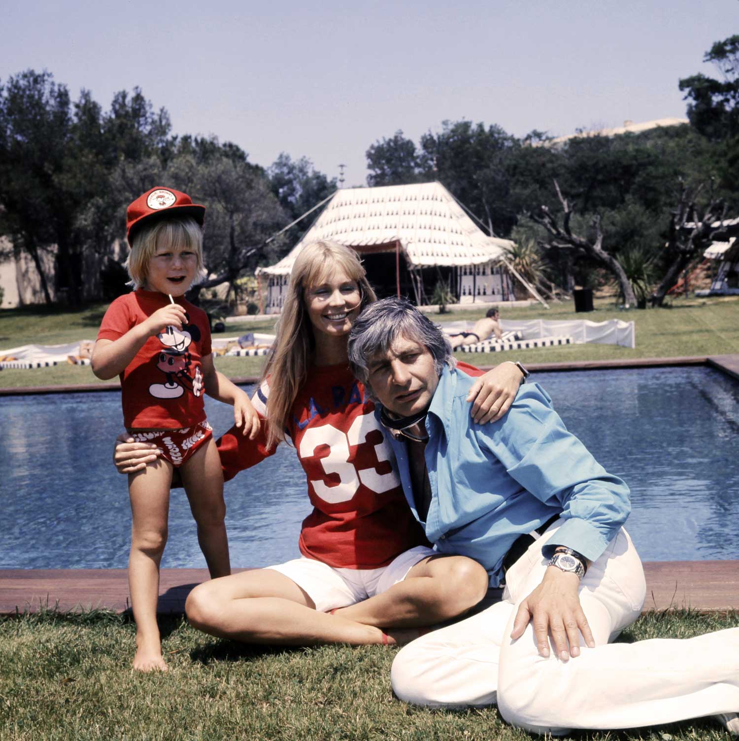 A photo taken on June 26, 1975 shows German multi-millionaire industrialist Gunter Sachs and his family, his son and wife Mirja in Saint-Tropez, southern France; on his wrist is a steel 5402, which reaffirms Gunter Sachs' as an early adopter and tastemaker (Image: STRINGER/AFP via Getty Images)