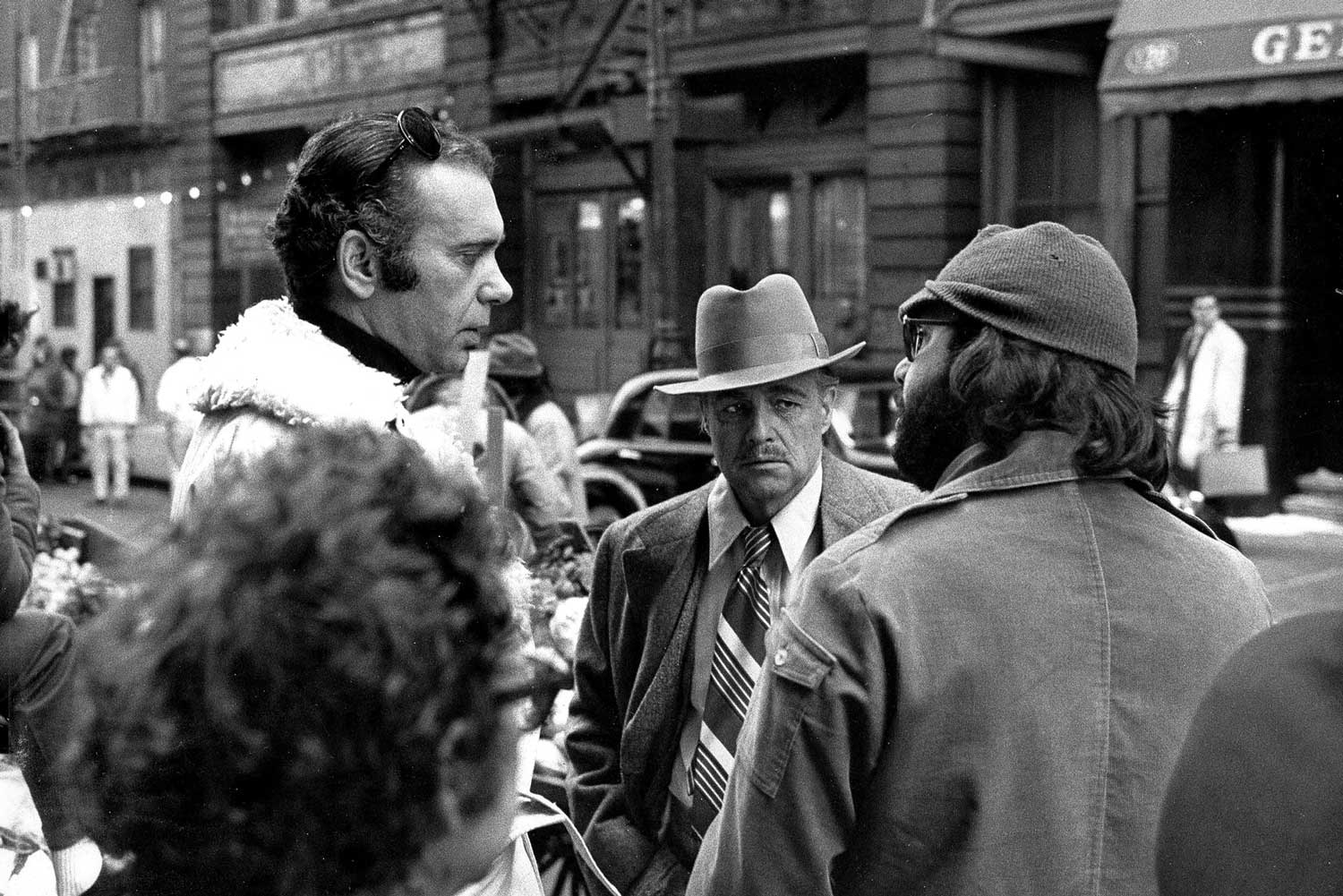 On set with Marlon Brando, as Don Vito Corleone, Francis F. Coppola to the right of the frame and Albert S. Ruddy to the left (From the Everett Collection/vanityfair.com)