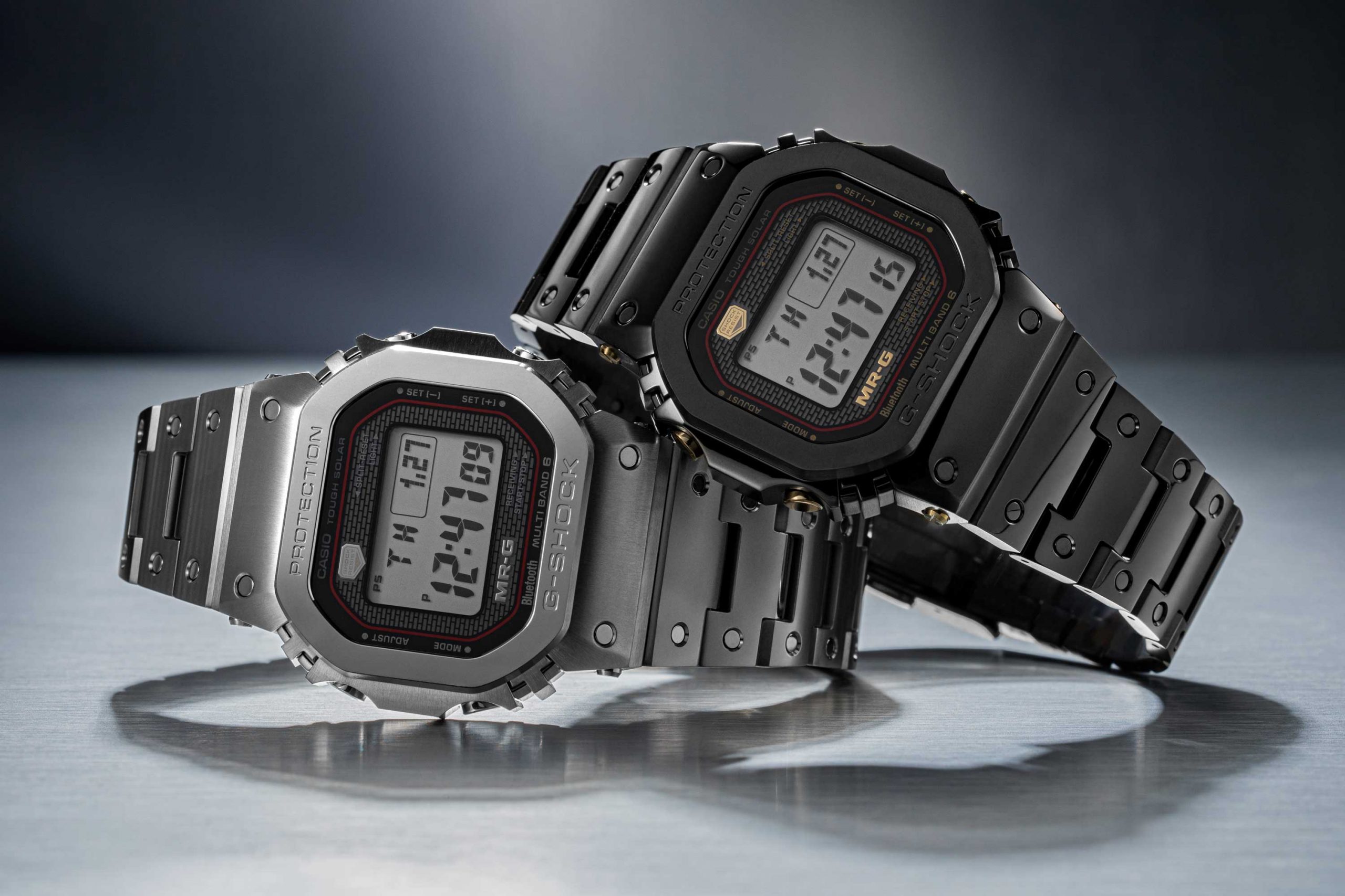 The G-SHOCK MRG-B5000D-1 in stainless steel and the MRG-B5000B-1 with a black DLC coating (©Revolution)