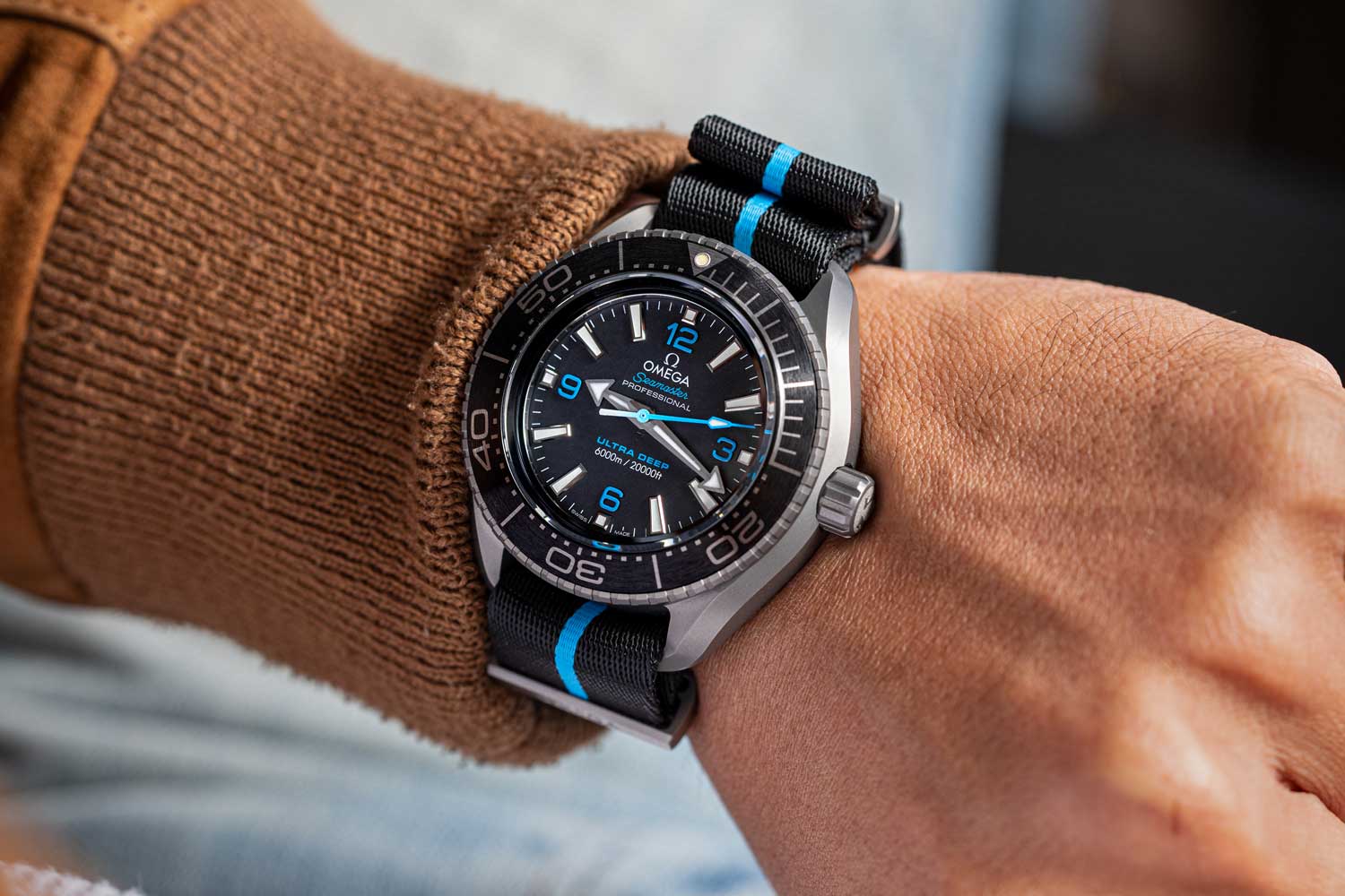 The Ultra Deep titanium wears comfortably on the wrist despite its size. A matching titanium bracelet would have been nice but you can’t go wrong with a NATO strap from Omega. (Image: Revolution©)