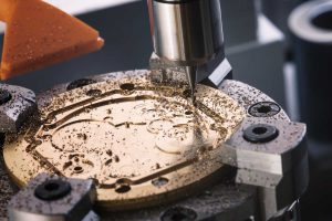 Machining the case back out of tungsten carbide is no easy task. The material has a hardness level second only to diamond