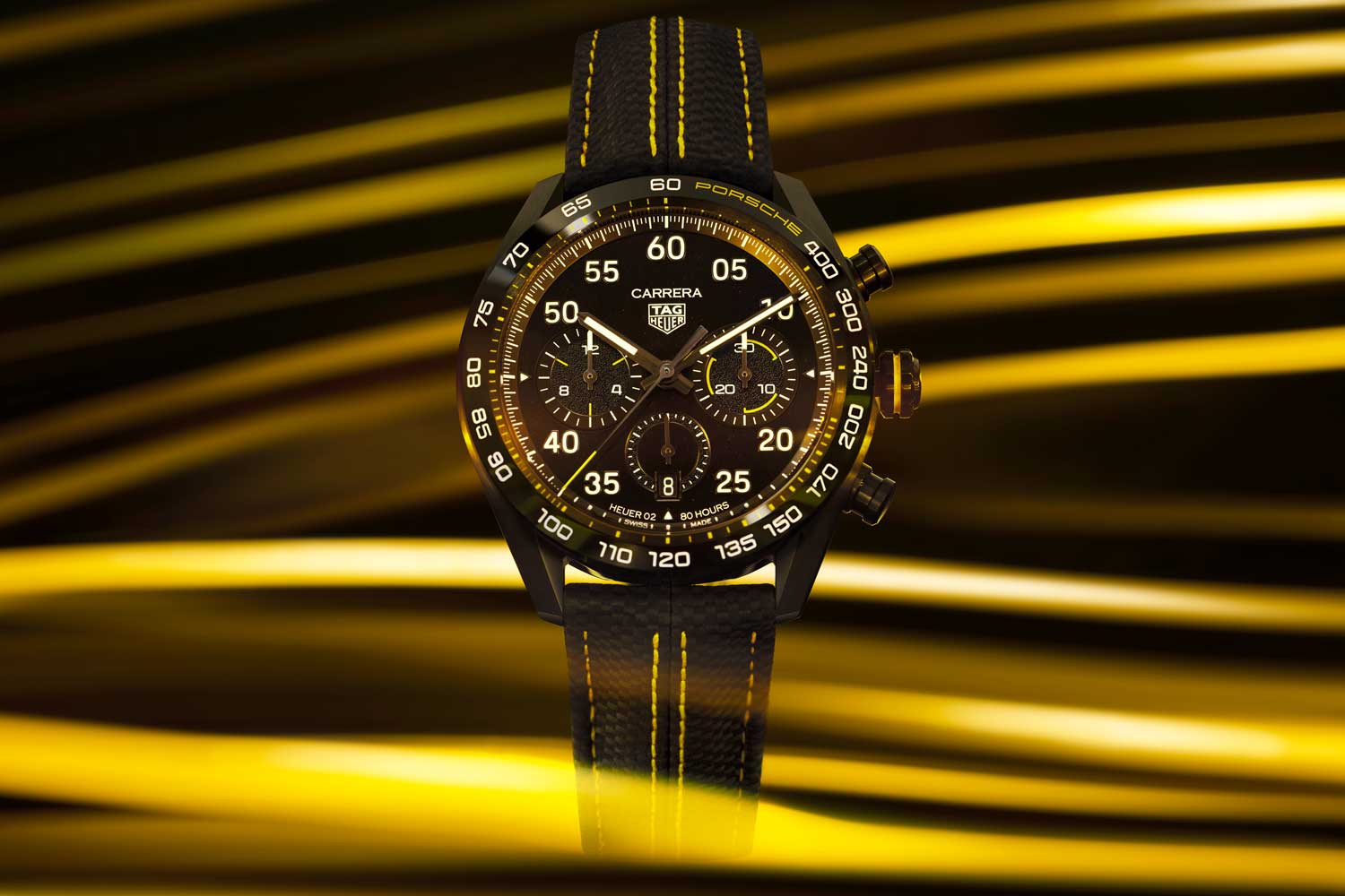 Black and yellow dominate in the latest expression in the partnership between TAG Heuer and Porsche