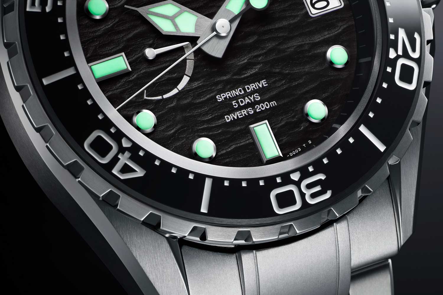 On closer inspection, there’s nothing plain about this marine-inspired black dial