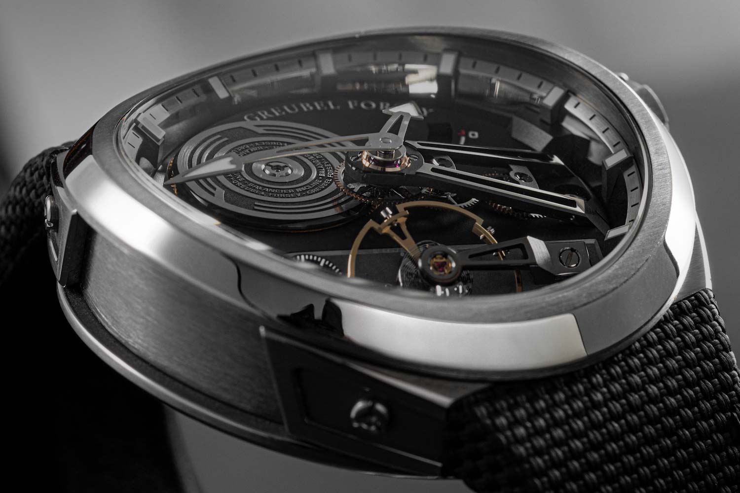 The titanium ovoid case is a groundbreaking piece of design, as the whole case is contoured to fit the wrist. The sapphire crystal and movement bridges are fashioned in the same shape as the case, which gives the entire watch visual harmony. (Image: Revolution©)