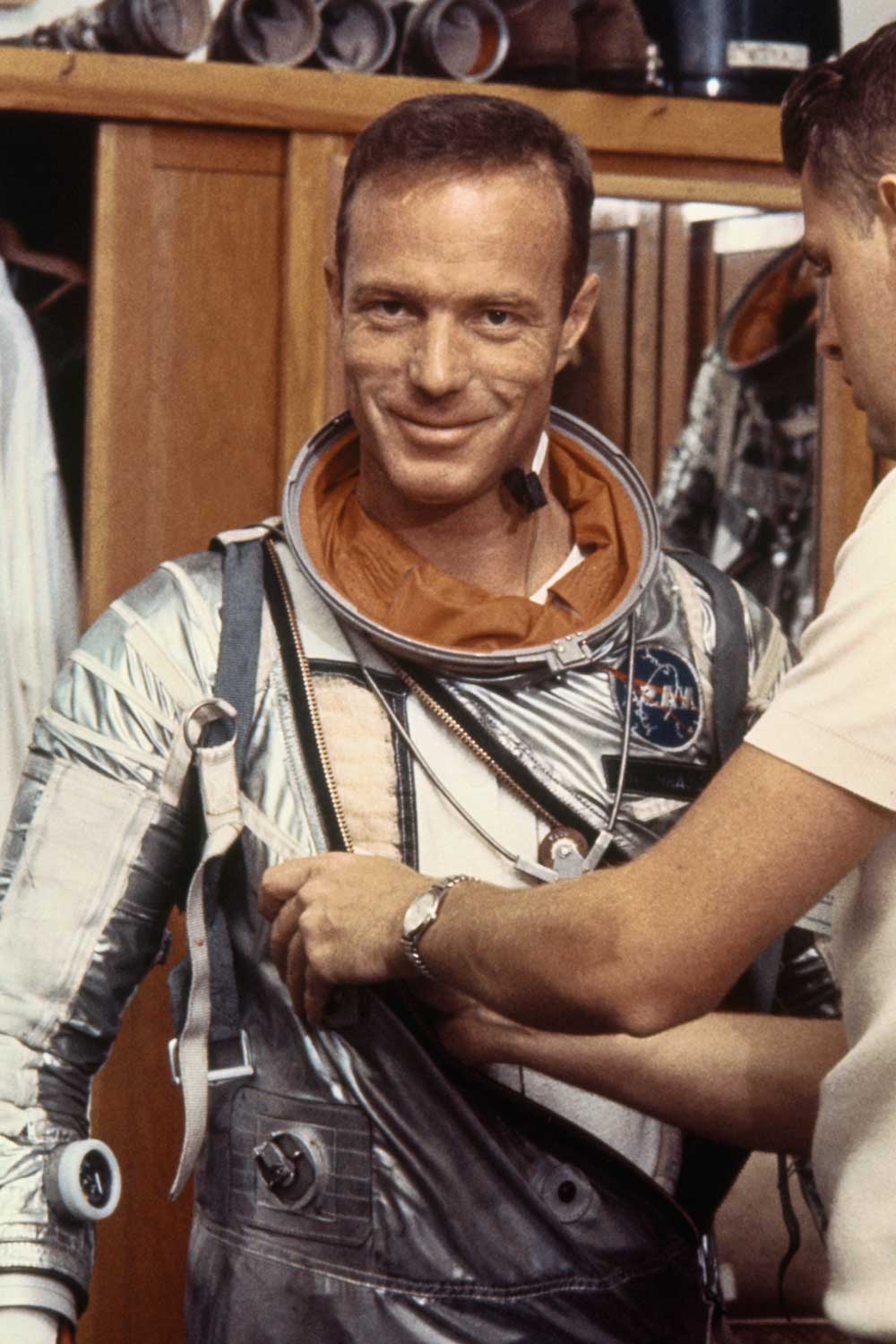 Scott Carpenter dons the Project Mercury suit he will wear on his MA-7 orbital flight (Image: GettyImages)