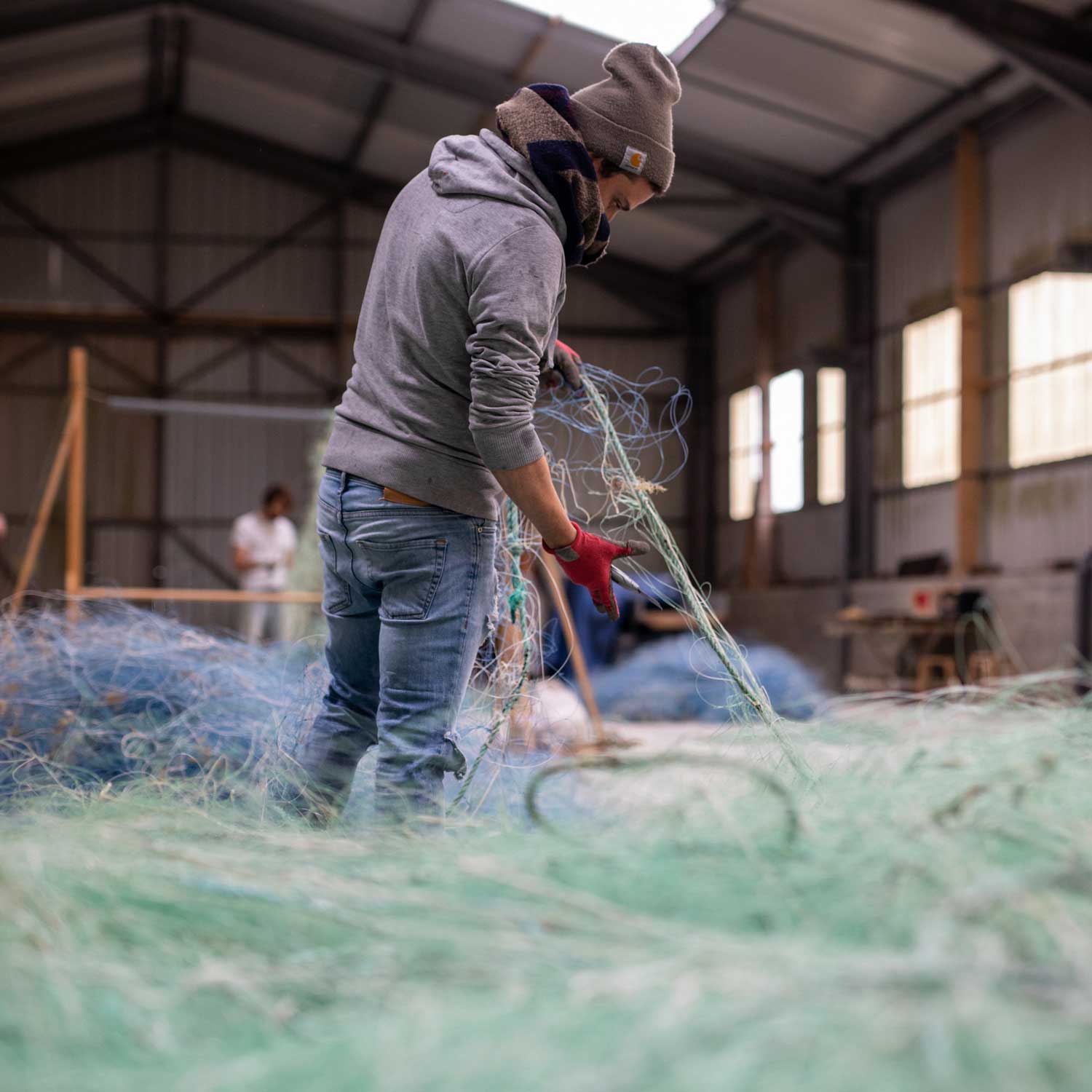 Before the transformation of the nets into a usable fabric, Fil & Fab classifies the nets by hand. More than 640,000 tons of discarded fishing nets float in the ocean, destroying aquatic ecosystems.